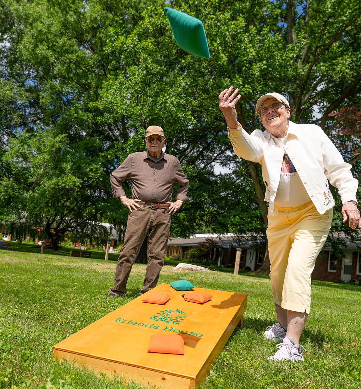 residents playing cornhole