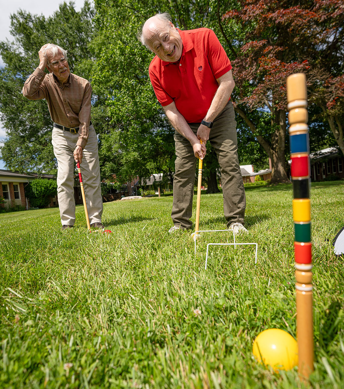 residents playing croquet