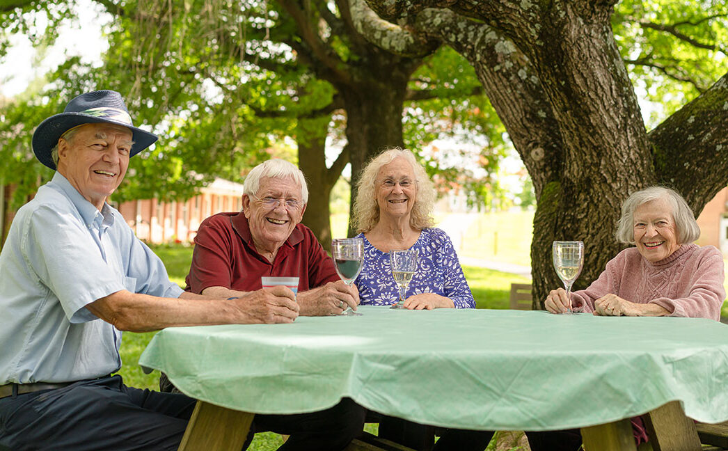 residents at picnic table